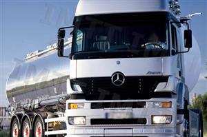 O condutor de um veículo pesado de mercadorias, ao detectar que a carga transportada se apresenta instável, deve: