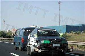 Qual a velocidade máxima a que este automóvel ligeiro de passageiros com reboque, pode transitar nas vias reservadas a automóveis e motociclos?